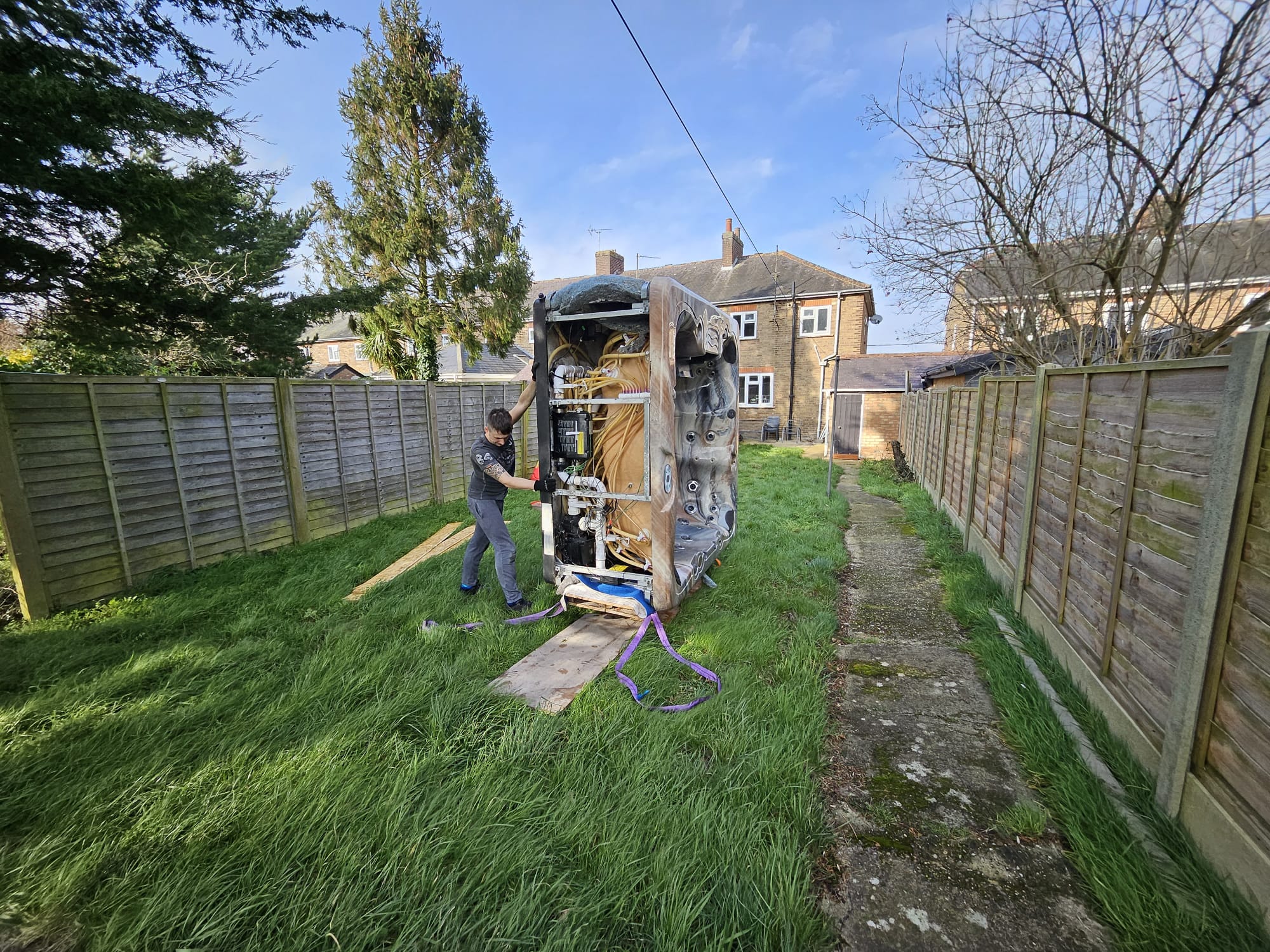 7 seater Jacuzzi delivery via neighbour's garden