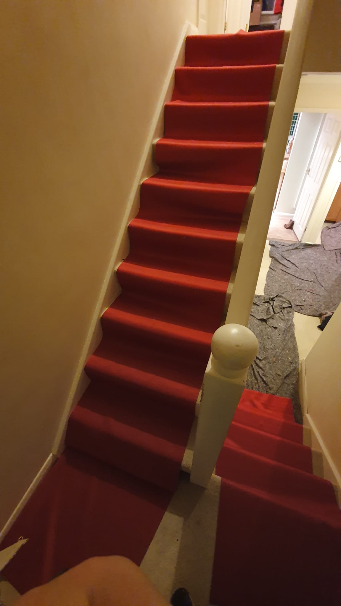 Red protection runners for our clients' lovely homes
