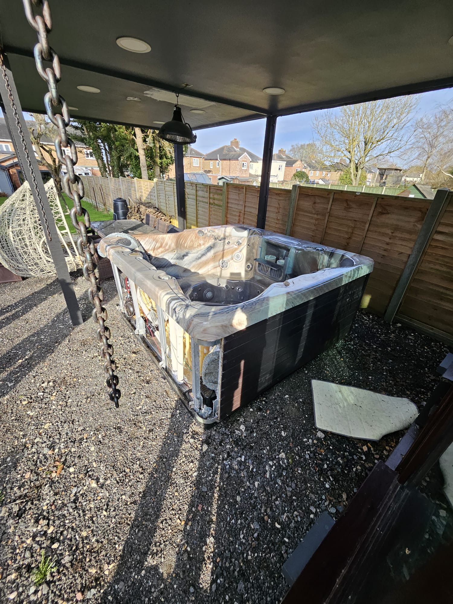 7 seater Jacuzzi made it to its spot via neighbour's garden
